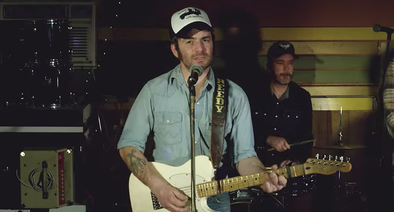 Watch: Workingman Country Singer Pat Reedy Performs “True Blue”